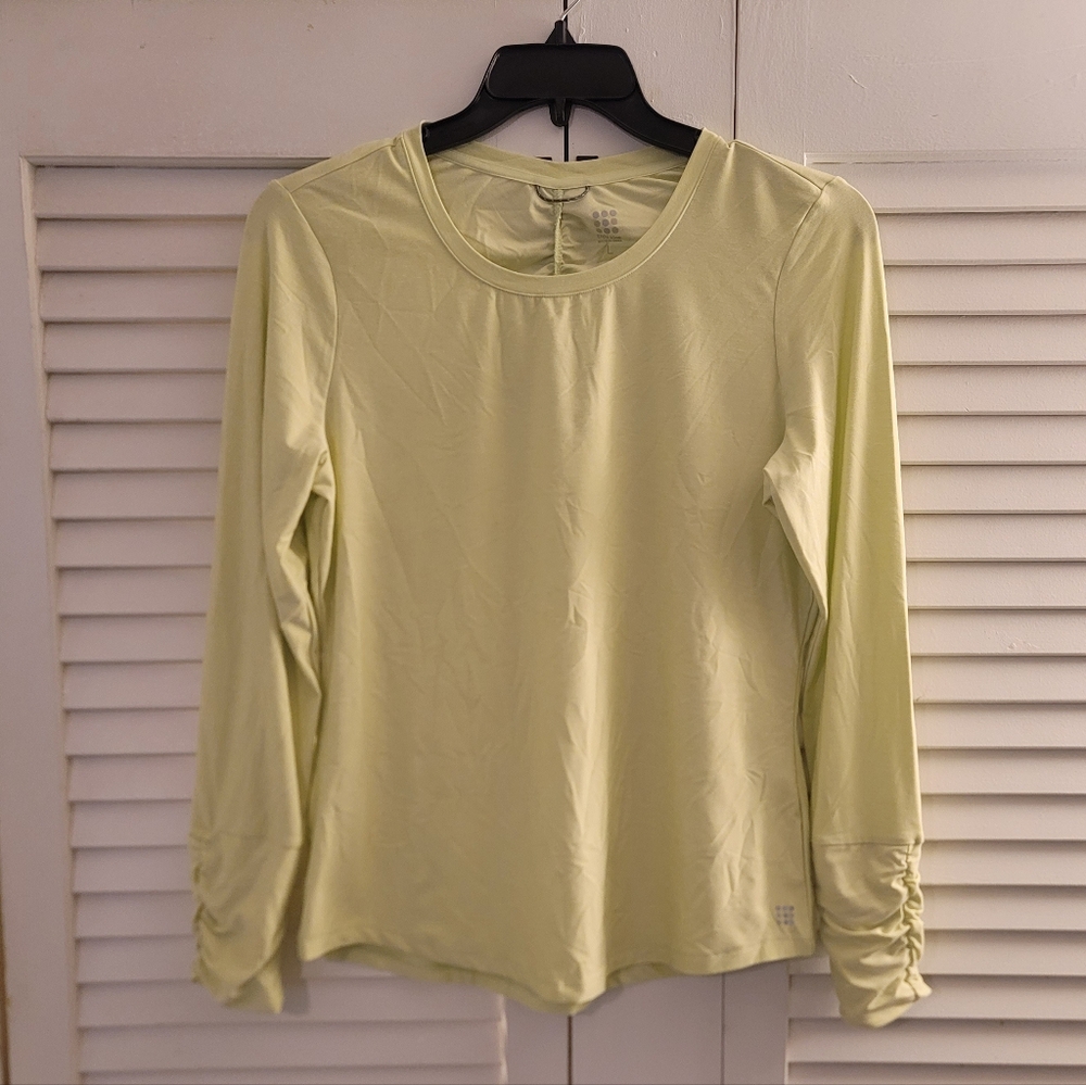 WOMEN'S TITLE NINE TOP.